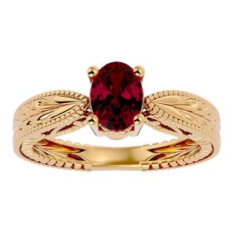 1 1/2 Carat Oval Shape Ruby Ring With Tapered Etched Band In 14 Karat Yellow Gold