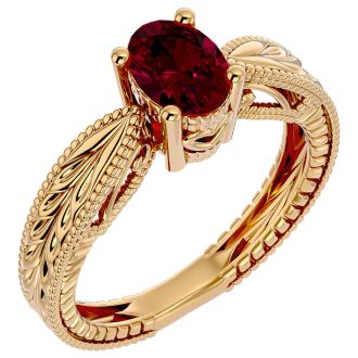1 1/2 Carat Oval Shape Ruby Ring With Tapered Etched Band In 14 Karat Yellow Gold