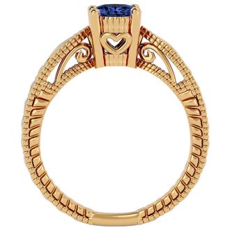 1 1/3 Carat Oval Shape Tanzanite Ring With Tapered Etched Band In 14 Karat Yellow Gold