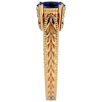 1 1/3 Carat Oval Shape Tanzanite Ring With Tapered Etched Band In 14 Karat Yellow Gold