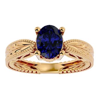 2 3/4 Carat Oval Shape Sapphire Ring With Tapered Etched Band In 14 Karat Yellow Gold