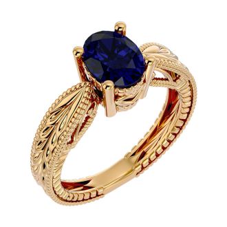 2 3/4 Carat Oval Shape Sapphire Ring With Tapered Etched Band In 14 Karat Yellow Gold