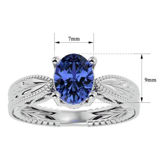 2 Carat Oval Shape Tanzanite Ring With Tapered Etched Band In 14 Karat White Gold