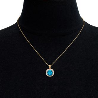 2 3/4 Carat Cushion Cut Blue Topaz and Halo Diamond Necklace In 14 Karat Yellow Gold, 18 Inches