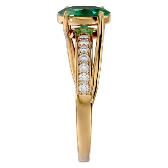1 1/3 Carat Oval Shape Emerald and Diamond Ring In 14 Karat Yellow Gold