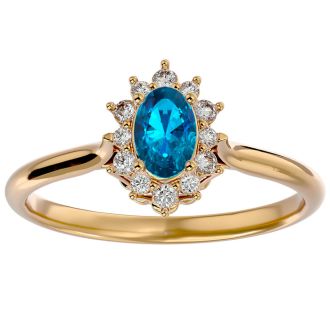 2/3 Carat Oval Shape Blue Topaz and Halo Diamond Ring In 14 Karat Yellow Gold