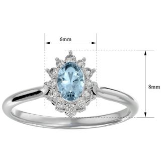Aquamarine Ring: Aquamarine Jewelry: 2/3 Carat Oval Shape Aquamarine and Halo Diamond Ring In 14 Karat White Gold