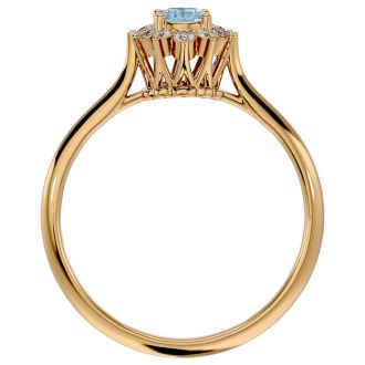 Aquamarine Ring: Aquamarine Jewelry: 2/3 Carat Oval Shape Aquamarine and Halo Diamond Ring In 14 Karat Yellow Gold
