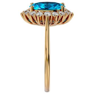 3 3/4 Carat Oval Shape Blue Topaz and Halo Diamond Ring In 14 Karat Yellow Gold