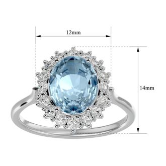 Aquamarine Ring: Aquamarine Jewelry: 2 3/4 Carat Oval Shape Aquamarine and Halo Diamond Ring In 14 Karat White Gold