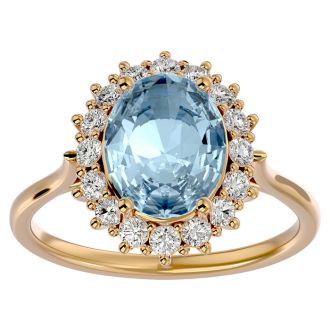 Aquamarine Ring: Aquamarine Jewelry: 2 3/4 Carat Oval Shape Aquamarine and Halo Diamond Ring In 14 Karat Yellow Gold