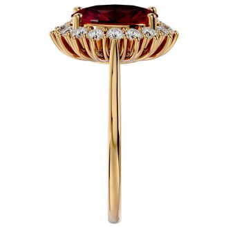 3.60 Carat Oval Shape Ruby and Halo Diamond Ring In 14 Karat Yellow Gold