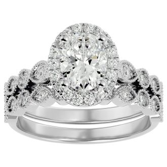 1 1/2 Carat Oval Shape Diamond Bridal Set In 14 Karat White Gold
