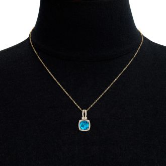 3 3/4 Carat Cushion Cut Blue Topaz and Halo Diamond Necklace In 14 Karat Yellow Gold, 18 Inches
