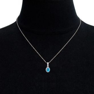 1 1/3 Carat Oval Shape Blue Topaz and Diamond Necklace In 14 Karat White Gold, 18 Inches
