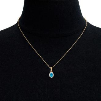 1 1/3 Carat Oval Shape Blue Topaz and Diamond Necklace In 14 Karat Yellow Gold, 18 Inches