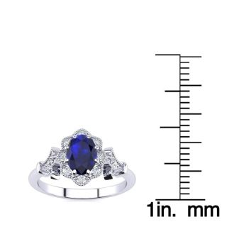 1 Carat Oval Shape Sapphire and Halo Diamond Vintage Ring In 1.4 Karat Gold™