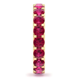 3 Carat Round Ruby Eternity Band In 14 Karat Yellow Gold, Band Size 4.5