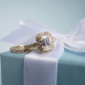 3 Carat Emerald Cut Halo Lab Grown Diamond Bridal Set In 14 Karat Yellow Gold