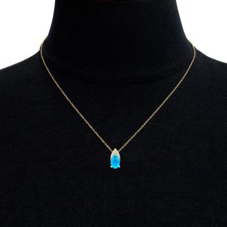 7/8 Carat Pear Shape Blue Topaz and Diamond Necklace In 14 Karat Yellow Gold, 18 Inches