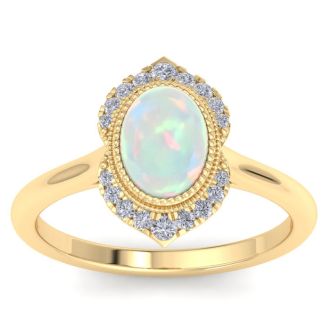 1-1/5 Carat Oval Shape Opal Ring and Diamonds In 14K Yellow Gold