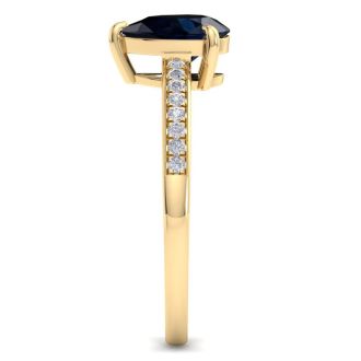 Sapphire Ring: 1 1/4 Carat Pear Shape Sapphire and Diamond Ring