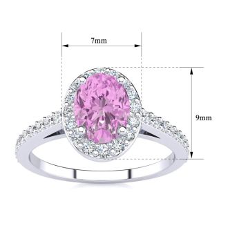 Pink Sapphire Ring: 1 Carat Oval Shape Created Pink Sapphire and Halo Diamond Ring In Sterling Silver