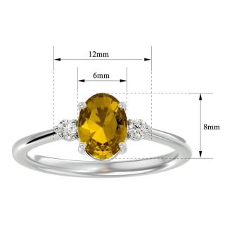 Citrine Ring: 1 1/3 Carat Oval Shape Citrine and Two Diamond Ring In Sterling Silver