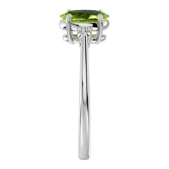 Peridot Ring: 1 1/3 Carat Oval Shape Peridot and Two Diamond Ring In Sterling Silver