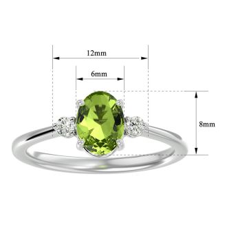 Peridot Ring: 1 1/3 Carat Oval Shape Peridot and Two Diamond Ring In Sterling Silver