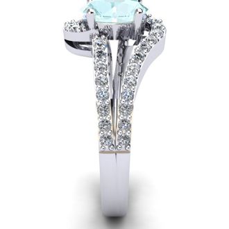 Aquamarine Ring: 1.40 Carat Oval Shape Aquamarine and Fancy Diamond Ring In Sterling Silver