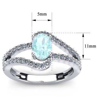 Aquamarine Ring: 1.40 Carat Oval Shape Aquamarine and Fancy Diamond Ring In Sterling Silver