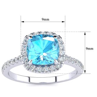 Blue Topaz Ring: 2 Carat Cushion Cut Blue Topaz and Halo Diamond Ring In Sterling Silver