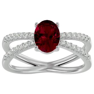 Ruby Ring: 1 1/2 Carat Oval Shape Created Ruby and Halo Diamond Ring In Sterling Silver