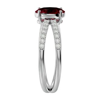 Ruby Ring: 1 1/2 Carat Oval Shape Created Ruby and Halo Diamond Ring In Sterling Silver