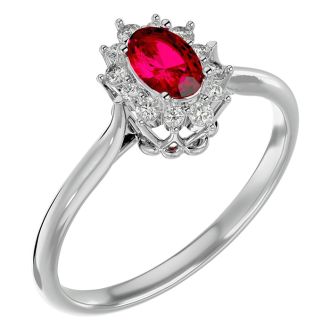 Ruby Ring: 2/3 Carat Oval Shape Created Ruby and Halo Diamond Ring In Sterling Silver