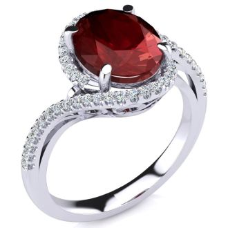 Ruby Ring: 2 3/4 Carat Oval Shape Created Ruby and Halo Diamond Ring In Sterling Silver