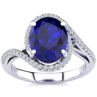Sapphire Ring: 2 3/4 Carat Oval Shape Created Sapphire and Halo Diamond Ring In Sterling Silver