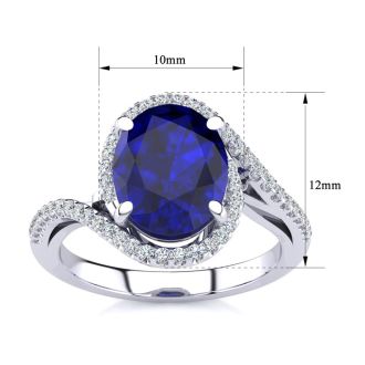 Sapphire Ring: 2 3/4 Carat Oval Shape Created Sapphire and Halo Diamond Ring In Sterling Silver