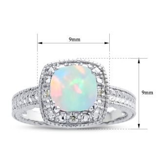Opal Ring: 1 1/4 Carat Cushion Cut Created Opal and Halo Diamond Ring In Sterling Silver