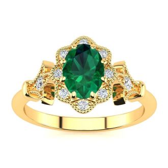 1 Carat Oval Shape Emerald and Halo Diamond Vintage Ring In 14 Karat Yellow Gold
