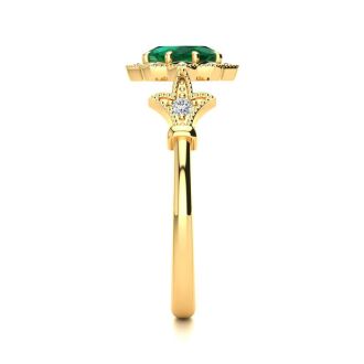 1 Carat Oval Shape Emerald and Halo Diamond Vintage Ring In 14 Karat Yellow Gold
