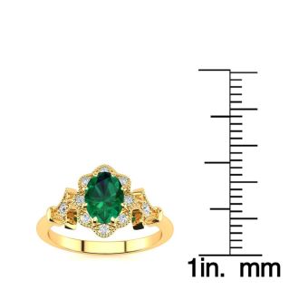 1 Carat Oval Shape Emerald and Halo Diamond Vintage Ring In 14 Karat Yellow Gold