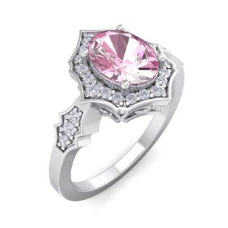 Pink Sapphire Ring: 1 1/2 Carat Oval Shape Created Pink Sapphire and Halo Diamond Ring In Sterling Silver