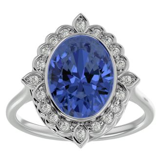 1 1/2 Carat Oval Shape Tanzanite and Halo Diamond Ring In 14 Karat White Gold