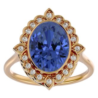 1 1/2 Carat Oval Shape Tanzanite and Halo Diamond Ring In 14 Karat Yellow Gold