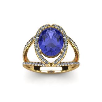 1 3/4 Carat Oval Shape Tanzanite and Halo Diamond Ring In 14 Karat Yellow Gold

