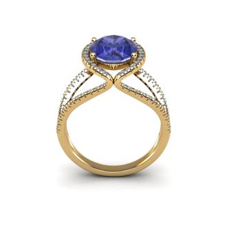 1 3/4 Carat Oval Shape Tanzanite and Halo Diamond Ring In 14 Karat Yellow Gold

