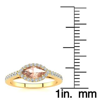 3/4 Carat Marquise Shape Morganite and Halo Diamond Ring In 14 Karat Yellow Gold