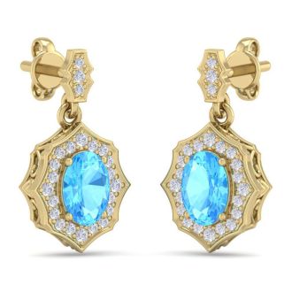 2 1/4 Carat Oval Shape Blue Topaz and Diamond Dangle Earrings In 14 Karat Yellow Gold